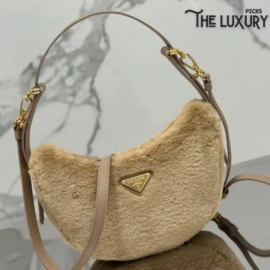 Prada Arqué shearling and leather shoulder bag